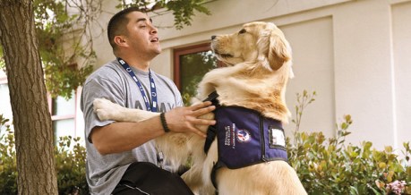 Robert Soliz is a former Army Specialist participating in Paws for Purple Hearts. Another group that pairs veterans with PTSD  (Photo Credit: Joseph Matthews, Veterans Affairs) 